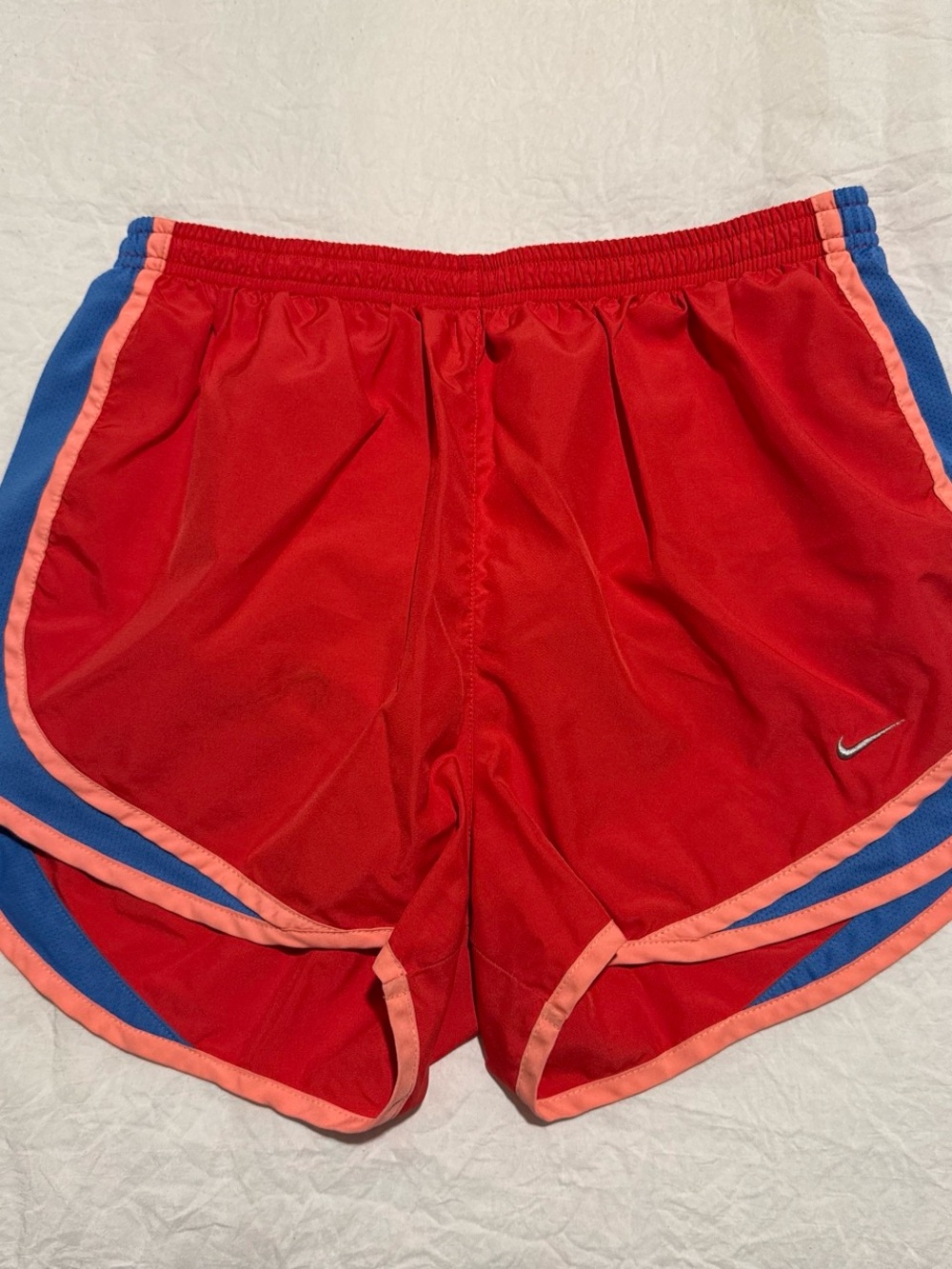 Nike Red Athletic Shorts with Pink Trim and Blue Panels